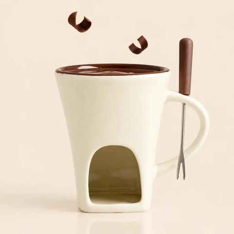 A studio photograph of exactly one beige ceramic mini-pot mug from the reference, upright and large
